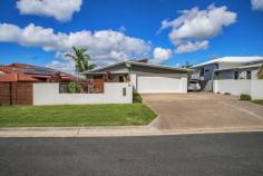  5 Stephanie Court Glenella QLD 4740 $599,000 Situated in one of the most sought after suburbs in Mackay this 4 bedroom, 2 bathroom, house ticks all the boxes. 4 bedrooms complete with fans, air conditioning and built in robes. The main bedroom with a walk in robe has an modern ensuite. The kitchen is modern with electric appliances, breakfast bar and is open plan to include the dining room and lounge. There is also another formal lounge. Entertain your guests on the big deck with great views or relax with friends in the secluded private spa beneath the deck. The yard is fully fenced to keep the dog in. The gardens are beautifully manicured. As well as having a double garage there's a carport for the trailer or other vehicles. Call agent for a private inspection. Estimated rental appraisal, done by a Property Manager, at approximately $490- $520 per week. 