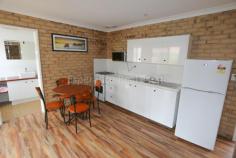  16/59 The Esplanade Esperance WA 6450 A double brick, one bedroom holiday unit, single persons' quarters or rental investment ideally located across from the foreshore and a stone's throw from town centre. Combined kitchen/dining/living area with wood look vinyl flooring, modern kitchen, reverse cycle air conditioner and ceiling fan. A hanging barn door leads to the bathroom/laundry with solid timber bench top. Protected courtyard and electric hot water. 