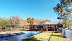  41 Greatorex Road Ilparpa NT 0873 $627,000 Set on a 1-hectare allotment this rural residence holds stunning views of the MacDonnell Ranges, secure fencing to the boundary, and a project in progress ready for you to make your mark. The home itself incorporates a welcoming open plan kitchen/dining and family area with two spacious bedrooms and two bathrooms. With an environmentally conscious design that maximizes home efficiency, this unique property provides plenty of space for entertaining with 360 degrees extra-wide veranda's, a separate undercover entertaining area, and a wonderful lawn area overlooking the saltwater swimming pool and spa. The addition of a separate studio is located within 50 meters of the house with plumbing already in place for potential future development of a Granny Flat. A property of this size is only complete with a shed, so you will appreciate the 7mx9m powered garage with a mechanic pit and a line of tall horse stables currently in use as car storage. Main Features Include: - 2-bedrooms 2-bathrooms - Large open plan kitchen, living and dining area - Storage room - Combustion Heater - Evaporative cooling throughout - Large powered garage including mechanics pit - photovoltaic solar system - 12-meter Saltwater inground swimming pool - Stables - Secure boundary fencing - Additional Studio with potential to convert into Granny Flat..41 Greatorex Road Ilparpa NT 0873 $627,000 Set on a 1-hectare allotment this rural residence holds stunning views of the MacDonnell Ranges, secure fencing to the boundary, and a project in progress ready for you to make your mark. The home itself incorporates a welcoming open plan kitchen/dining and family area with two spacious bedrooms and two bathrooms. With an environmentally conscious design that maximizes home efficiency, this unique property provides plenty of space for entertaining with 360 degrees extra-wide veranda's, a separate undercover entertaining area, and a wonderful lawn area overlooking the saltwater swimming pool and spa. The addition of a separate studio is located within 50 meters of the house with plumbing already in place for potential future development of a Granny Flat. A property of this size is only complete with a shed, so you will appreciate the 7mx9m powered garage with a mechanic pit and a line of tall horse stables currently in use as car storage. Main Features Include: - 2-bedrooms 2-bathrooms - Large open plan kitchen, living and dining area - Storage room - Combustion Heater - Evaporative cooling throughout - Large powered garage including mechanics pit - photovoltaic solar system - 12-meter Saltwater inground swimming pool - Stables - Secure boundary fencing - Additional Studio with potential to convert into Granny Flat.. 