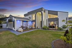 1 Cutwater Close Clear Island Waters QLD 4226 You will be pleasantly surprised as soon as you enter this well designed double storey home by its sheer size, high ceilings and light filled interiors seamlessly integrating the indoors and outdoors, making this home the perfect family retreat. Don't miss this great opportunity to purchase something quite special in the prestigious and tightly held "Moorings" estate in Clear Island Waters. • Expansive 5 bedroom, 3 bathroom home with plenty of room for the entire family • Several formal and informal living spaces opening onto the entertainment area • The master suite boasts a huge walk-in robe in addition to an ensuite and balcony • Set on a sprawling 885m2 fully fenced corner allotment with side gates • Large pool - perfect for entertaining friends and family • Double lock-up garage plus additional parking behind secure gates Located in one of the Gold Coast's most sought after residential enclaves "The Moorings" renowned for its close proximity to everything. Just a short distance from the Q-Super Centre and Robina Town Centre as well as the vibrant Broadbeach, Pacific Fair and the Star Casino. You are also surrounded by elite schools, including All Saints, Somerset College and St Vincent's Primary School. Everything you could possible want is at your fingertips. This property is being sold by auction or without a price and therefore a price guide cannot be provided. The website may have filtered the property into a price bracket for website functionality purposes only. All information contained herein is gathered from sources we believe to be reliable. We cannot however guarantee its accuracy & interested parties should make & rely on their own enquiries. 