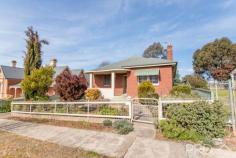  14 Wynyard Street Tumut NSW 2720 Offered to the market for the first time in over twenty years, you will love the centralised position of this extremely well-maintained post war double brick home. Nestled just a very short stroll to the Tumut River, local parks and the CBD itself, you will love the large internal layout and low maintenance lifestyle this brick beauty has to offer. Boasting two great sized bedrooms and the ability to include an additional with the extremely spacious rumpus area to the rear of the plan, updated kitchen and low maintenance yards. All the hard work is done, move in and enjoy the lifestyle of this centrally located home. Opportunities such as this are rarely seen in the tightly held area of Wynyard Street, it is sure to not last long! Will be sold on or before auction. Call today to book your inspection! Premiere Features: - Two great sized bedrooms with high ceilings and built-in robes - Well maintained bathroom with toilet, single vanity and separate shower - Large updated eat in style kitchen with ample storage options and centrally located in the hub of the home - Semi formal lounge positioned to the front of the plan with gas heating, ceiling fan and split system air conditioning - Huge rumpus area to the rear of the home, ample space for a third bedroom if preferred and ceiling fan - Secondary toilet positioned to the rear of the plan - Large internal laundry - Rear fully covered outdoor entertaining area - Quaint low maintenance rear garden - Secure shed positioned to the rear with power and lighting - Rear vehicle access to yard - Front deck, fully covered overlooking the local parks - Fully fenced 607m2 allotment - Gas mains connected - Short stroll to the Tumut River, Bila Park, River Walks, Tumut CBD and local amenities and services - Sash windows throughout Do not miss your opportunity to secure such a well-maintained brick home in the tightly held area of Wynyard Street, call today and book your inspection! 