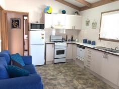  52/396 Princes Highway Ulladulla NSW 2539 $310,000 Beachside Village, is a quiet and tranquil park that backs on to the beautiful Racecourse Beach in Ulladulla. You are literally minutes from dipping your toes in the sand and enjoying a swim in the ocean. This village park is only a 2-3 minute drive into Ulladulla CBD where you can enjoy many restaurants, shopping and entertainment. The park is very friendly and definitely has a village community feel to it and is surrounded by an open nature reserve. IMPORTANT: occupation is only 182 days per year. You can rent it or holiday let it out but you will be using your 182 days. Park fee $155 per week. The unit offers – – Good sized lounge – Meals area with a view of the ocean – Raked ceilings – Kitchen with plenty of bench space, cupboards and a half sized dishwasher – Two good sized bedrooms with built in robes – Bathroom with shower over a corner spa bath and has a skylight ceiling to enjoy the night sky – Separate toilet – Laundry incorporated in the bathroom – Front covered entertaining deck with views of the ocean – Blinds on the deck for privacy and protection if it is windy – Heating and Cooling – Single car space along side the unit but long enough for two vehicles or a car and a small boat – Bottle gas – Gas cooking – Land is approx.. 10 x 13m2 – Auto watering system – New blinds – Furniture is WIWO – Only a two minute easy flat walk to the beach The park offers – – The units in the park are only to be used for up to 182 days – You could potentially rent it out for holiday letting for up to that 182 days but you would be using those days – You can have up to 2 small dogs – Enclosed and outdoor camp kitchen – Outdoor BBQ.. 
