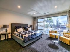  21 Andrea Ave Broadbeach Waters QLD 4218 Looking across great water views with Surfers Paradise as your backdrop. Walk to everything Broadbeach has to offer. Located in one of the most sought after streets in Broadbeach Waters. Rarely available!! Features: * 6 bedrooms, all with ensuites * 7 bathrooms in total * Master bedroom with private balcony and walk in robe * Massive open living areas * Gourmet kitchen and second Butlers kitchen/scullery * Full separate cinema room * Separate study/office * Central courtyard with water features * Large pool and spa * Pontoon and ocean access * Ducted air conditioning throughout * Triple garage.. 