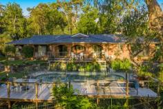  41 Roderick Street Maclean NSW 2463 This exceptional property is one of a kind! With a commanding position within Maclean that overlooks the stunning township below with a vista of the Might Clarence River and hills of Ashby. Set on a huge 5362m2 block which is tucked away in a serene location that offers loads of potential plus there is the ability to subdivide, subject to council approval. This solid home offers 4 bedrooms and has gone through some recent renovations including new kitchen and bathrooms, new lighting and more. From entering the home through the double doors you will appreciate the huge living space, where you will find built-in-cabinetry along the back wall which provides excellent storage. You can also cosy up by the lovely wood heater positioned in the corner. The kitchen is a great neutral tone and would keep the chef of the house happy with modern appliances plus a integrated dishwasher, insinkerator and of course a sink with a VIEW. The master bedroom boasts an ensuite, walk-in-robe and a sliding door with direct access onto the covered veranda. Bedrooms two & three are located towards the back of the home and both offer built-in-robes and are located close the stylish main bathroom. The fourth bedroom is currently being utilised as a study. The laundry area has a 3rd toilet and offers access to the large double garage connected to the home via a breezeway and plenty of extra parking for vehicles on the huge concrete driveway and there is room for additional shedding. Another exceptional drawcard to this property is the stunning and very private in-ground salt-water pool and entertaining area that is engulfed with amazing views of the river and valley below and not to mention the beautiful gardens with insulated sprinklers. This property has so many elements and great features and it is hard to list them all but if you are looking for that special property to call home this is a must to inspect, as there is no other like it. Additional Features • 	 Solar power & solar hot water • 	 Security alarms • 	 Ducted Vacuum • 	 Plantation shutters • 	 Full concrete driveway & parking • 	 2 x garden sheds & green house • 	 Air-conditioning • 	 Remote access to garage doors FEATURES: • 	 Salt Water Concrete Pool 