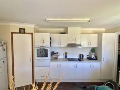  1 Keperra Place Moree NSW 2400 $279,000 • Flood free solid brick house • 3 beds, 2 bath - rooms have built ins • Kitchen and dining rooms connected with bar/ entertaining area • Carpeted lounge room with wood fire heating • Evaporative A/C and ceiling fans throughout • Large back yard with established grass and is fully fenced • Main bedroom with ensuite • Gates into the yard access • Double lock up garage • Close to shops, chemist, school and tavern • Approx rent in this market $350 - $400.. 