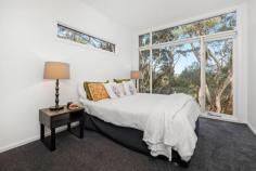  130 Avon Road Rye VIC 3941 $1,695,000 - $1,850,000 An iconic and admired back beach escape, this much-loved family home is perfectly positioned in one of Rye's most sought after and prestigious locations literally footsteps to the surf. Built well ahead of its time and hidden among Moonah trees with the roar of the surf and the National Park only 300m away, this HIA award winning master builder home (Everclear) was crafted for stylish oceanside holidays or a permanent seachange. Designed by architect Emma Tulloch and taking inspiration from mid-century modernism, this could be a just-completed home, but with recent updates gives the impression of a brand-new residence. Boasting a sparkling 8m x 3m in-ground pool, set in beautifully landscaped coastal gardens offering total privacy and sunny sheltered decks to entertain alfresco, the new owners can enjoy a rare synergy with the stunning coastal environment. Just a short stroll to the spectacular Lizard Rock and No.16 beach for an early morning surf, the three-bedroom residence takes you on a journey through intriuging spaces for the ultimate seachange or relaxed weekend getaways. High ceilings and an abundance of north facing glass flood the open plan living area with natural light that connects to the alfresco deck with views over the pool, travertine paved terraces and vine-covered arbor. Stunning leather granite benchtops feature in the kitchen along with a new stainless-steel stove and dishwasher while Italian marble tiles are the floor choice for the bathroom, laundry and powder room. The master bedroom has an outdoor bath and shower, a second large bedroom features its own sitting area that seems to hover in the landscape and a large picture window in the third bedroom perfectly frames the twisted forms of Moonah trees in the front yard. This quiet and seperately zoned bedroom is the perfect guest space hidden behind a sliding door. Set on almost one-third of an acre and full of interest and intrigue at every turn, other features include ducted heating, split-system airconditioning, polished hardwood floors, rooftop solar panels and a remote garage. Hockingstuart | Belle Property is proud to be offering this property for sale. To arrange an inspection or for further information, please contact Mal McInnes on 0415 502 316 mal.mcinnes@belleproperty.com 