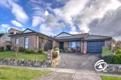  35 Coachwood Crescent Narre Warren VIC 3805 $930,000 - $980,000 Impeccably finished to the highest standards this stunning four bedroom plus study residence provides the perfect lifestyle for a growing family. Nestled on an elevated block in a blue-chip location with easy access to all services including Westfield shopping centre, freeway, schools and sporting facilities. Features split level design with separate living zones, the central kitchen has a huge walk-in pantry that has direct access to garage. There are two separate oversized garages allowing storage for three cars plus ample workspace. Some of the numerous extras include a superb built-in bar, jarrah polished floorboards, fully air-conditioned and quality fittings. Entertain in style all year round under a covered pergola complete with pizza oven before spending a relaxing day by the sparkling inground pool that is complimented by a heated spa. So much more to see and appreciate by inspecting this quality home. 