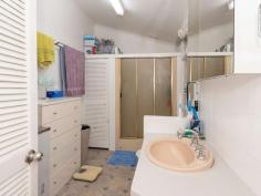 185 Union Street South Lismore NSW 2480 $499,000 Well exposed to the Bruxner Highway in South Lismore, this unique property has a B6 Enterprise Corridor zoning, offering a host of options for the astute investor or owner occupier. Situated on a 1058 square metre allotment, the highset dwelling has side access from Union Street and the added bonus of drive through access to and from Cromer Street. The home consists of three bedrooms, all with air conditioning, and the main with walk-in robe. The kitchen is modern with ample cupboard and bench space whilst the bathroom/laundry is in an original tidy condition. The loungeroom is air conditioned for added comfort and there are polished timber floors and high set ceilings throughout. An enclosed sunroom at the front of the home and a covered deck to the rear, completes the package. Downstairs is fully concreted and has an abundance of shelving for storage. The majority of the land is bitumen sealed providing off street parking and has the added bonus of an approved D.A for a 18 metre x 7 metre x 5 metre industrial shed. Seize the moment...seize the opportunity. 