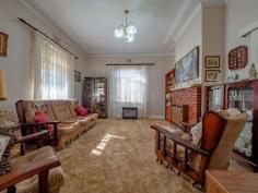  8 The Circle Lithgow NSW 2790 $395,000 Located in one of the region's most sought-after locations is this 3 bedroom residence oozing old-world charm. At the front of the property is an enclosed verandah looking out onto the mature trees making for a peaceful outlook. Upon entering the home you are greeted by high ceilings & a crystal chandelier which contribute to the vintage feel from the kitchen to the bathroom. Features include • Separate Lounge • 3 bedrooms main with built-in • Second dining or study area • Outside laundry • Separate toilet internally The home sits on a parcel of approx 483.9sqm with a separate garage and carport.. 