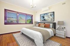  7 Pelman Avenue Belmore NSW 2192 Tucked away at the end of a peaceful cul-de-sac, this classic double brick period home presents a gracious single storey layout making it perfect for the growing family. The convenient setting is ideally located in strolling distance to Belmore station, playgrounds, shops and local schools. - 3 tidy bedrooms, two appointed with built in wardrobes - Light-filled open plan living and dining area with gas fireplace - Neatly maintained kitchen with new Italian gas stove and ample cupboards - Bright sunroom living area opening to tranquil landscaped gardens - Low maintenance level backyard and fenced underground swimming pool - High ceilings, polished timber floors throughout and two aircon units - Classic tiled main bathroom with separate bathtub - Separate internal laundry with second bathroom and shower - Ample off-street parking on side driveway leads to carport and lock-up garage - Delightful front patio overlooking peaceful front gardens - 750m to Belmore Station and 850m to Canterbury Leagues Club - 600m to All Saints Grammar School and 5 minutes to Belmore Sports Ground This classic family home is an idyllic haven of peace and convenience, located centrally to Belmore hub in a family-friendly locale. 