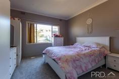  44 Mayday Road Batlow NSW 2730 $305,000 Positioned just a very short stroll along mayday road, you will love the space afforded in this highest three-bedroom home. Boasting a large internal layout with free-flowing kitchen, dining and living areas, with all bedrooms positioned away from the hub of the home for privacy and a great sized rear yard with double bay shed and a fully covered front entertainer's deck. 44 Mayday Road certainly is an opportunity not to be missed, call today to book your inspection! Premiere features: • Three great sized bedrooms, two with built in robes • Bathroom with combined shower and bath, single vanity • Large open plan kitchen with ample bench space and storage, induction cooktop and stainless appliances • Dining positioned off the kitchen • Additional large sunroom at the rear of the plan • Semi formal lounge with wood fire heater and split system air conditioning • Separate toilet • Internal laundry • Large fully covered front deck • Under house storage both front and back • Double bay shed • Fully fenced rear yard • 734m2 Allotment 