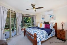  10 Ballymore Ct Banora Point NSW 2486 Enjoy peace & tranquility from this immaculate (3) bedroom low set residence, adjoining native parklands, which are only parted by a delicate spring fed stream that meanders its way down from Trutes Bay to the foot of your property. KEY FEATURES: - Formal living with cathedral ceilings & romantic fire place - Well-appointed kitchen & dining area w/ split system air-conditioning - Master bedroom w/ walk in robe, built in robe, stylish ensuite & split system air-conditioning - Beautiful modernised main bathroom, w/ separate WC - Generous all weather alfresco entertaining area, w/ cafe & sun blinds - Double automatic garage w/ internal access, plus additional space alongside for van/boat etc - Workshop / tool shed - ideal man cave - Fully fenced low maintenance gardens - Solar power (16 panels = 3KW) LOCATION: You will enjoy the convenience of local shopping at Banora Central (anchored by Coles) within a moment's notice, as well as Banora Village and Tweed City, also close by. Local schools such as Centaur Primary & Banora High are just a short push bike ride from class, with St James / St Joseph's just a few minutes beyond. A bus service also operates through this area as well as transport to Lindisfarne Anglican Grammar, which is only about (7) minutes. For beach lovers and surfers, you can have your toes in the sand or carving up world class breaks at the fabulous Gold Coast beaches at around (10) minutes from home, as too the GC Airport & Southern Cross Uni. 