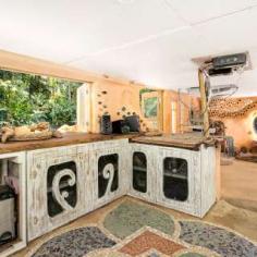  Lot 12 Oak Forest Road, Kuranda , QLD 4881 SUSTAINABLE OFF THE GRID IN STYLE WOW - If you are looking for something that allows your imagination to run wild, offers you a space to call home that is totally off the grid, private, functional & one of a kind - You will be very happy with this unique opportunity. This block is approximately 5.2 acres, totally tucked away and has loads of improvements is an understatement. A solid structure that offers living & sleeping areas 2 Sheds Solar power 2 Rainwater tanks Edible gardens So much more Contact the agent for more information and a private inspection. Land: 	 2.1044 ha / 5.2 acres Bedrooms: 	 3 Bathrooms: 	 1 Learn more.. 