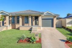  29 Carnarvon Circuit East Maitland NSW 2323 With a captivating street presence in one of the most desirable locations of East Maitland, on the high side of the highway, stands this perfect size three bedroom, two bathroom duplex which showcases everything the modern day buyer is looking for, with luxurious light filled living spaces and a practical floor plan for a relaxed lifestyle. Spread across a stunning, low maintenance 324sqm block in an extremely unique yet peaceful environment and still having easy access to all amenities including the refurbished Stockland Greenhills Shopping Centre, the New Maitland Hospital Site, local parks plus playgrounds, private/public schools, local transport and just easy 30 minute drive to Newcastle CBD. Set across a single level design, with striking street appealing plus manicured/established grounds it is a true indication of what lies within. Stepping inside the home the quality continues with split system air conditioning, premium lighting, large sunlit windows with vertical blinds, tiled/carpeted floors and a light crisp colour palette throughout. The heart of the home is the stunning, light filled open plan living, dining and kitchen area, that is complemented with views of the private alfresco. An immaculate kitchen is on offer for the avid cook of the family and showcases premium cabinetry, large pantry, quality stainless steel appliances including a electric cooktop/oven and a dishwasher for family convenience. A formal lounge is located at the front of the home, that is the perfect spot to catch up on some much needed movie time with the family. The master suite is incredibly spacious with a built in wardrobe plus a private ensuite. A sense of light flows throughout the remaining two bedrooms, which both benefit from size and both have built in wardrobes. The main bathroom is centrally located and is complete with both a bathtub and shower for family convenience. The perfectly proportioned open plan living, dining and kitchen area features glass sliding doors that merge flawlessly out onto the entertainers alfresco, that is perfect for entertaining family and friends all year round. There is a single lock-up garage attached to the home for all your storage needs with internal access. Extra features: • 2014 Built Home • Brick & Tile • Internal laundry • Linen storage • NBN • Water tank • Torrens Title 