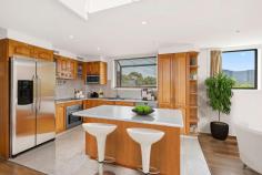  3/49 Bourke Street North Wollongong NSW 2500 $1,100,000 Occupying the entire two top floors of a boutique complex, this premium apartment beckons the young family, rising professional or discerning downsizer with its blend of modern comfort and sweeping district views. North-facing with windows on three sides, interiors radiate a classic retreat vibe and are complemented by a loft-style lounge or study leading to the spectacular wraparound rooftop terrace. Perfectly positioned for both workday convenience and weekend play, this is a wonderfully comfortable home base within strolling distance of North Beach, coastal cafes and free shuttle transport. Features: Sleek sun-filled design with feature void over dining area Expansive outlooks to escarpment range, ocean glimpses Timber kitchen with dishwasher; internal laundry room Neat ensuite, generous robes, ducted air through main level Intercom, huge garage, pets on request, 213sqm on title Prime lifestyle locale minutes from Blue Mile, station + CBD 