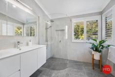  114 Forest Drive Repton NSW 2454 $1,700,000 - $1,800,000 Located at the end of the street and bordering National Park at the rear, this amazing property has one of the most private and tranquil settings of any property on the Coffs Coast. Approximately 15 mins drive from the Coffs Harbour CBD and minutes to nearby local beaches this property offers amazing convenience yet feels as if you are a world away from anywhere. Set back from the road and hidden behind a wall of green the home itself is positioned on almost 5 acres of bush and rainforest. The home was designed by the current owners and has been a labour of love for almost 40 years where they have created a peaceful environment with beautiful gardens, lush lawns and tranquil views. Once inside the home a contemporary renovation has recently been completed and no expense has been spared. From the stone look tiles and timber floors to the quality bathrooms and the spectacular kitchen this property has so many special features that it is impossible to list them all. A split level design with raked ceilings and feature windows offers plenty of natural light and there are tranquil views everywhere. The parents retreat or master suite was an addition to the home and offers the lucky purchaser their own escape with a private study, separate sitting area and its own private balcony. The renovated ensuite has only recently been completed and includes a curved glass shower screen, floor to ceiling tiles and quality fixtures. Step down to the main living/dining area and prepare to be impressed with the polished timber floors, wood fireplace, feature pendant lighting and the most amazing picture window that looks over the simply stunning 12m concrete pool. The kitchen is also on this level and has been finished to a very high standard with custom granite benchtops, and quality appliances. As you move outside onto one of the largest outdoor entertaining areas I have ever seen you will be captivated by the beautiful bush outlook and start to get a real sense of how private this home really is. The spa is in the perfect spot to sit and watch nature and is even better with a glass of wine whilst you lay back and gaze at the stars. The pool is another amazing feature and has been beautifully landscaped and is large enough for the whole family to enjoy at the same time. For those with multiple vehicles parking is by way of a double garage plus an overheight carport to fit a caravan, boat, trailer or extra vehicles. There are also 2 driveways that access the property, one for the house and one for the nursery. ***Nursery*** The specialist nursery is currently operating as a registered wholesale business and could continue to operate as is and is a proven viable business. The owners have a diverse world class species collection of Bromeliads as their core business. The infrastructure to run a commercial nursery will be sold with the property and includes an automated watering system utilising town and or tank water. The stock of Bromeliads is not included in the sale and if the buyer desired to continue with the current business structure the owner would negotiate a wholesale price separately. ***Extra Features Include*** - Solar power system with large battery storage connected to house and nursery - 4 climate control capable green houses - Extensive shade houses and gardens - Large permanent cantilever pool umbrella - 4 person HotSpring spa - Approximately 84m2 of outdoor entertaining deck - Large capacity Eureka slow combustion fireplace - FTTN NBN Connection - Telstra Mobile reception booster 