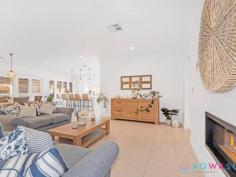  8 Hummingbird Way SINGLETON WA 6175 This perfectly packaged residence sits on a 567sqm parcel of coastal land and has everything your heart could desire. Inspection is a must as words cannot express what an absolute delight this stunning home is! This light, bright sunny home has an attractive entrance that leads to the home theatre on the right and onto the main living with integrated gas flame wall heater, meals area and very well appointed kitchen with scullery hidden behind the statement barn door. The master suit has a custom fitted walk in robe and has a stunning open plan bathroom with free standing bath, his n hers basins, seamless shower and separate wc. There is a large home office which could easily be used as bedroom 4, family bathroom, well thought out laundry and bedrooms 2 and 3 that have built in robes. Sliding doors from the meals area take you out to the alfresco entertaining with water feature and custom made blinds area that over looks the paved sun deck and sparkling below ground pool. A few of the properties many features are; • Ducted reverse cycle air con • Neutral décor • Caesar stone benches • Scullery • Solar power • High ceilings • Lopi integrated gas fire • Heated below ground pool • Alarm system and security cameras • Plantation shutters • Custom blinds to Alfresco • Triple garage • • • • • • • • the list goes on! Walk to beaches, park, lake, primary school, transport, shopping village where you have bakery, deli, pizza café, Chinese restaurant, bakery and fish n chips. The shopping centres of Karnup, Secret Harbour and Lakelands are just a short drive with the freeway access also not too far away. 