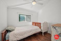  2 Church Street Nana Glen NSW 2450 $539,000 - $569,000 This charming country cottage is the ideal place to start if you want to live off grid & enjoy this most beautiful little paradise of your own. Live like you are a million miles from the rest of the world, yet have the convenience of being a few hundred meters from everything you need. The corner store, bottle shop, cafe, pharmacy, local primary school & pre-school, service station, playing fields & swimming holes are all within a short walk from your home. All this & situated in the end of a quiet country cul-de-sac, just 25 minutes drive to the thriving city of Coffs Harbour & 20 mins to the beach. From the white picket fence at the front, to the beautiful crystal clear stream at the rear, this delightful property has so many quaint aspects you will love. Those wanting to live off grid & eat of the produce from your own land will appreciate all that's been done here to set up a lifestyle you can reap the benefits of for many years to come. With approximately 40 different types of fruit trees & food producing plants in the garden, the foundation has been laid for the keen gardener. From your sunny back verandah deck, there is nothing but the serene green valley & views as far as the eye can see. Looking out on the misty mornings over the paddocks & across the stream is a picture that dreams are made of. A shady, treed covered corner of the garden will be the children's magical wonderland to play in for hours on end - complete with a treehouse overlooking the nearby stream & farmland. Original hardwood floors & fireplace will appeal to those who love character & a relaxed cozy country feel. If you are longing for a simpler life and want to return to the land without having to buy the big acreage to do it, this property will certainly fit your requirements on many levels. 