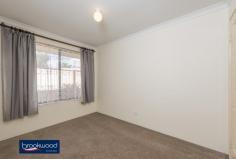  77 Clayton St Bellevue WA 6056 $374,000 Are you looking four more?  Surprisingly spacious, this freshly refurbished home has four bedrooms and four living areas including a large kitchen/dining area plus family room, formal lounge and activity room giving you space to spread out and relax. Sitting neatly on a 476sqm front block, this easy-care property is conveniently located on the edge of Midland, just minutes from the new hospital, train and commercial precinct. 4 bedrooms 2 bathrooms Surprisingly spacious t/out Open plan kitchen/dining Plush comfortable lounge Bright family & activity rm Two paved alfresco patios Securely fenced, easy care Convenient 476sqm block Close to bus & hospital From the bus stop out the front to the hospital down the road, this is an incredibly convenient location with excellent access and connection to major arterial roads. Yet step inside this Federation-style brick and tile home and the world outside will melt away to the Great Indoors. Start your weekend morning cooking a lazy breakfast in the spacious red brick and Jarrah kitchen where there’s room to add an island bench or country table and chairs. It has an electric oven, grill, gas cooktop and built-in pantry. Relax in the dining area with its high ceilings and reverse cycle air-conditioning to read the paper. Or perhaps wander into the family room with a cuppa to enjoy the natural light, which streams in through the bank of glazing on the external wall. A large picture window facing the kitchen affords a clear sight line without the noise. New carpet has been laid in the family room, formal lounge room and the bedrooms.  The master bedroom sits opposite the comfortable lounge by the front door and has a bay window overlooking the garden, a reverse cycle air-conditioner, walk-in robe and ensuite. The fresh junior bedrooms have built-in robes and alcoves in most and share a central open activity/play area, a family bathroom and laundry. There’s enough garden to soften the edges of the well fenced brick paved surrounds, alfresco patio and single carport with barely a thought to its maintenance. Run a lawnmower over the small patch of lawn at the front and your weekend gardening jobs list is complete. With the Helena River, the Swan Valley, Midland and airport links on your doorstep, this fantastic home offers facility well beyond its price tag.  Great for investors or no fuss family living. 