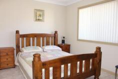  34B North St Ulladulla NSW 2539 Situated just 750m from iconic Ulladulla Harbour and 1.5km to Mollymook Beach. This is the ultimate family entertainer in the ideal location. – Massive triple drive through garage with kitchenette and extra shower and toilet. – Impressive timber kitchen with moveable island bench, double ovens – Massive open plan kitchen, dining, family area – Plantation shutters – Large wood fire for those chilly nights – Lovely elevated views – Covered patio area – Main bathroom with huge corner bath and twin vanities. – Main bedroom with ensuite and built-in robes – Established vegetable gardens – Ample off street parking – Large laundry with ample storage and office with storage area – Solar panels This home is just beautiful, a quality home that your whole family can enjoy! 