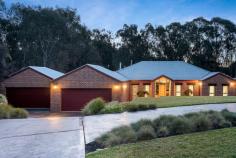  4 Stableford Place West Wodonga VIC 3690 Beautifully set amid glorious established gardens on a spacious allotment of 2287m2, this pristine 3 to 4 bedrooms home effortlessly delivers a contemporary family lifestyle with formal/informal living and a brilliant connection to the outdoors with a stunning sparkling salt chlorinated pool. Peaceful and private, there is space for everyone to live, relax, work from home and entertain all year round in this one-owner single-level residence built by Davis Sanders Homes. It's exceptional presentation and functionality are the stuff dreams are made of in this family-friendly area close to Golf course, schools and shops. Nothing has been overlooked from the circular concrete driveway, four car garage, two outdoor living areas, outdoor bathroom and spacious play areas for children and grand children to play and explore. So many extras including stunning gardens, additional storage, solar panels, rainwater tank and fabulous outside wood fire. For those who love Golf you will love the proximity to the Golf Course, in fact the backyard backs onto the 18th Hole. Enquire today for a private inspection of this magnificent property situation in one of Wodonga's most sought-after dress circles. 