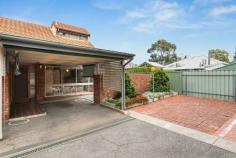  8/305 Portrush Road Norwood SA 5067 This gorgeous red brick townhouse is spacious and light filled, with soaring double height ceilings and a private back yard. The open plan living and dining room benefits from raked ceilings and large windows, with easy-care tile floor. Split system air conditioning takes care of the climate control. A servery hatch takes you through to a modern kitchen with electric oven and stovetop, ample bench space and extensive storage. You'll find even more storage in the generous laundry, with a second WC for convenience. Upstairs, both bedrooms are of a good size, and share a fresh modern bathroom. Indulge in your own private spa bath! It's tucked behind a private fence, in a quiet corner position away from the traffic of Portrush Road. A peaceful low maintenance courtyard is the perfect spot to savour that morning cup of coffee. There are two car parking spaces, one undercover. The location couldn't be better. You're just 10 minutes from the CBD and 5 from Victoria Park. It's a short stroll to a range of excellent schools, both government and independent, shops and public transport. Vibrant Norwood Parade offers boutique shopping, amazing cafes and eateries and entertainment options including the Hoyts cinema complex. It's perfect for first home buyers and downsizers who value lifestyle and location. Investors can be assured of continuing strong demand in this very popular area. Embrace the lock-up-and-leave lifestyle today! Offers subject to finance welcome What we love: Modern low maintenance property Double height ceilings and large windows in living area Two story red brick build Split system air conditioning Private back yard Two car parking spaces Spa bath in upstairs bathroom Amazing location close to Norwood Parade, excellent schools, public transport and parks Short drive to the CBD 