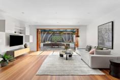  25 Abercrombie St Deepdene VIC 3103 $1,700,000 - $1,800,000 Making a statement in superb style, this stunning home strikes a timelessly sophisticated tone beyond its manicured garden facade. The sublime combination of high ceilings and timber flooring introduces the magnificent open plan indoor/outdoor living space, sleek stone kitchen, dining and lounge extend out to a fabulous wraparound alfresco courtyard, complemented with built in BBQ kitchen, water feature and bench seating, perfect for entertaining. The masterful floorplan accommodates a luxe master bedroom with private terrace, ensuite and walk in robe, second robed bedroom and bathroom upstairs and a ground floor third/guest bedroom with ensuite, laundry/butler's pantry, storage, ducted heating and vacuum, cooling, security alarm, remote garage and security gates. Its prized and exclusive position surrounded by prestigious schools and moments to the Anniversary Trail, trams, buses, shopping, restaurants and cafes only adds to this property's enormous appeal. 