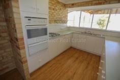  3 Thelma Street Castletown WA 6450 This brick veneer family home offers a spacious design with formal lounge and dining and open plan living including kitchen with sizeable workspace and WI pantry. Brand new, wood look vinyl throughout, gas bayonets and ceiling mounted, rev cycle aircon. Ensuite and walk-in robe to master bedroom while other 3 bedrooms have BI robes. Entertaining size patio and highline carport with roller door, leading to powered double garage at rear. Auto reticulated lawns. 