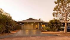 24 Tokumaru Bend Bilingurr WA 6725 $649,000 Looking for a modern, beautifully crafted family home in Broome's newest and most vibrant community? Look no further! Located in Broome North, this gorgeous four bed, two bathroom family home is guaranteed to impress. Purpose-built for modern family living, you'll love the beautifully crafted indoor and outdoor living areas, offering spacious and stylish spaces and multiple options for entertaining. Boasting great street appeal, manicured tropical gardens with mature palms lead you to the two-car undercover carport with a rear storage room with roller door. Light and bright, the modern interior boasts open-plan living and dining areas with feature tiling throughout and an abundance of natural light thanks to the addition of louvre windows. The gorgeous open kitchen is at the heart of the home, complete with stone benchtops, built-in corner pantry, stainless steel appliances, and a long breakfast bar with feature wood panelling. Other key features include the flexible front room accessible from the exterior - currently used as a beauty studio, a combined laundry/bathroom, air-conditioning, downlights, modern window blinds and more! The home itself boasts four big bedrooms, all with built-in robes, including the spacious master complete with private ensuite. Maximising Broome's outdoor lifestyle, the spacious undercover entertaining area at the rear comes complete with built-in BBQ, perfect for entertaining family or friends. You'll love the low maintenance yard with astroturf and reticulated gardens, and the added outdoor shower is ideal for returning from the beach. Located within walking distance to a number of local parks with fantastic playground equipment, and close to the new Broome North Primary School and Cable Beach, it's the vibrant, community-style living the whole family will enjoy. 