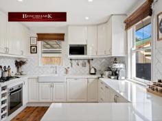  12 Ambon Rd Holsworthy NSW 2173 Features: • R3 Medium Density Zoning • Total land approx. 556sqm • Frontage approx. 16.15m • Potential rental return approx. $46,000 p.a Main Residence: Three-bedroom home that has been tastefully updated throughout and offers casual living area, polished timber floor boards throughout, with a large covered deck area and side access. • 3 bedrooms with built in robes • Timber floors throughout • Renovated Kitchen • Split system air conditioning • Renovated laundry • Gas heating and cooking Modern Nearly New Large 2 bedroom Granny Flat: Stylish modern design 2 bedroom Granny Flat. 12A Holsworthy has a private footpath to the side of the main residence as well as separate bins and a separate mailbox. • 2 Modern bedrooms with built ins; • Split system top of the range Daikin air conditioning unit • Continuous gas flow hot water • Combined large size laundry/bathroom • Stylish modern polished concrete floors • 45SQM backyard entertaining/courtyard area with home made pizza oven. The Property is conveniently positioned close to Holsworthy train station, M5 Access and only moments to local schools and Wattle Grove Shopping Centre. 
