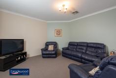  3 Minora Way Jane Brook WA 6056 $515,000 Embrace life in Jane Brook, confident in the knowledge that this home will adapt to the changing needs of a growing family. Multiple living areas, a separate adults’ zone, generous junior bedrooms, and a large media/activity room create a flexible floorplan with a spacious open plan kitchen/meals/family room at its heart. 4 bedrooms 2 bathrooms 2005-built brick and tile Formal & informal living Sep media/activity room Central open plan design Reverse cycle ducted AC Wrap-around alfresco ent 16-panel 3kW solar array Low maint 576 sqm block Parks, lakes, Hills, Valley This spacious family home sits behind the sweep of a green lawn and steps from the open space of Jane Brook Reserve. The front door opens into a tiled entryway with a formal lounge to one side and the spacious main suite to the other. The sunken lounge offers a quiet, east-facing sanctuary away from the activity of the central open plan. In the principal suite, a large bay window delivers ample natural light to a room finished in a calming neutral colour scheme. A walk-in robe and well-appointed ensuite build on the atmosphere of a private retreat. At the heart of the home is an expanse of open plan living with an adjoining activity media room. This flexible design delivers the freedom to adjust to changing priorities as your family grows and needs change. The kitchen is set in one corner of the open plan area and features a 4-burner gas hob, an electric wall oven and a walk-in pantry. A shoppers’ entry, ample under bench storage and an integrated breakfast bar make daily life a little easier. With space for a family-sized sofa and table and access to the wrap-around verandah, this family hub is sure to provide the backdrop to years of memories. Double doors open to reveal a large media/activity room and expand the functional living space. A gas bayonet in this room supplements ducted reverse cycle AC throughout the home. In the separate junior wing, three good-sized bedrooms with carpet and built-in robes are sure to delight children of all ages. A shared family bathroom with tub, shower and vanity, a separate WC and a walk-through laundry complete the layout of the junior wing. A sliding glass door connects the central living zone to a paved wrap around verandah with the 2-car garage at one end, and a Colorbond garden shed at the other. This expansive area, edged with raised garden beds, offers year-round outdoor living with both northerly and westerly aspects. Steps from the front door of this home is a reserve and walking path leading to the lakes and parks of Jane Brook. The shops and services of Midland are a short drive away, and primary and secondary schools are within easy reach. A Foothills setting delivers the outdoor adventure of the Perth Hills and the gourmet delights of the Swan Valley in equal measure. 