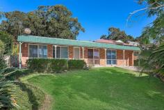  9 Gowan Place Gerringong NSW 2534 Situated within a quiet cul de sac location, this charming family home combines cozy and modern living with a convenient lifestyle. The sunny aspect creates a warm and inviting abode for the growing family to enjoy. With a versatile floor plan consisting of all a family could need, as well as a large private backyard backing onto the Noble reserve, this home is definitely the perfect place to make fond family memories. Updated bathrooms and kitchen with two spacious living areas will entice your large family to spread out in their own spaces and to enjoy the undercover entertaining area for those long summer afternoon BBQs. 