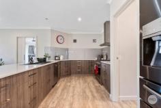  162 Pasley Street Huntly VIC 3551 $890,000 - $979,000 Sitting on over 4,000 square metres, this 5 bedroom home boasts fantastic size not only in the block but in the house itself. With 3 living spaces plus a parents retreat, and a dedicated home office, as well as 3 bathrooms. This fabulous Todd Newman build offers grand hallways and high ceilings throughout. Opening up into a large open plan living, dining and a kitchen area. The entertainers' kitchen boasts 900mm wide gas appliances, a large walk-in pantry, great amounts of storage and a breakfast bar. This space leads out to a large undercover alfresco area. The master bedroom offers a walk-in robe, ensuite bathroom with twin vanity and a separate parents' retreat. All remaining bedrooms are a great size and offer built-in robes. The home is kept comfortable with ducted heating and cooling throughout and also has the convenience of a double lock-up garage with direct internal access. The home also offers fantastic shedding and carport, plenty of room for all the toys! Huntly has seen fantastic growth, with great infrastructure and amenities.  