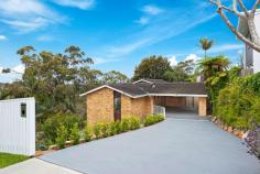 33 Bluegum Crescent Frenchs Forest NSW 2086 With an inspiring blend of retro 1960's architecture and contemporary appeal, this solid full brick two-story home enjoys a stunning 180-degree outlook over the valley and district. The newly renovated kitchen boasts plenty of storage and connects to a dining area and the spacious top floor living room. With french doors opening to a balcony you can take in the beautiful tree top scenery and distant views to the north east. The whole family will enjoy the versatility of this floorpan with three large living areas and five bedrooms spaced across the two floors and multipurpose spaces perfect for an at home business, gym or workshop. ? Solid full brick two storey home in a quiet location ? Views over Oxford Falls from most rooms ? Newly renovated kitchen ? Four generous size bedrooms plus study ? Three bathrooms refurbished ? Multiple living areas including a spacious open plan living area plus separate dining, family and rumpus rooms ? Potential for dual family living or larger families ? Double carport ? Plenty of storage through the home ? Bus transport nearby ? Five minute walk to Forest High School and the new Northern Beaches Hospital ? Fifteen minute walk to Forestway Shopping Centre and Frenchs Forest Primary School ? Fifteen minute drive to beaches Centrally located in The Forest and close to many amenities. 