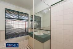  77 Clayton St Bellevue WA 6056 $374,000 Are you looking four more?  Surprisingly spacious, this freshly refurbished home has four bedrooms and four living areas including a large kitchen/dining area plus family room, formal lounge and activity room giving you space to spread out and relax. Sitting neatly on a 476sqm front block, this easy-care property is conveniently located on the edge of Midland, just minutes from the new hospital, train and commercial precinct. 4 bedrooms 2 bathrooms Surprisingly spacious t/out Open plan kitchen/dining Plush comfortable lounge Bright family & activity rm Two paved alfresco patios Securely fenced, easy care Convenient 476sqm block Close to bus & hospital From the bus stop out the front to the hospital down the road, this is an incredibly convenient location with excellent access and connection to major arterial roads. Yet step inside this Federation-style brick and tile home and the world outside will melt away to the Great Indoors. Start your weekend morning cooking a lazy breakfast in the spacious red brick and Jarrah kitchen where there’s room to add an island bench or country table and chairs. It has an electric oven, grill, gas cooktop and built-in pantry. Relax in the dining area with its high ceilings and reverse cycle air-conditioning to read the paper. Or perhaps wander into the family room with a cuppa to enjoy the natural light, which streams in through the bank of glazing on the external wall. A large picture window facing the kitchen affords a clear sight line without the noise. New carpet has been laid in the family room, formal lounge room and the bedrooms.  The master bedroom sits opposite the comfortable lounge by the front door and has a bay window overlooking the garden, a reverse cycle air-conditioner, walk-in robe and ensuite. The fresh junior bedrooms have built-in robes and alcoves in most and share a central open activity/play area, a family bathroom and laundry. There’s enough garden to soften the edges of the well fenced brick paved surrounds, alfresco patio and single carport with barely a thought to its maintenance. Run a lawnmower over the small patch of lawn at the front and your weekend gardening jobs list is complete. With the Helena River, the Swan Valley, Midland and airport links on your doorstep, this fantastic home offers facility well beyond its price tag.  Great for investors or no fuss family living. 
