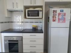  10 Rosalie Dr Yarraman QLD 4614 $450,000 This 3 bedroom brick home is set on 4041m2 on a corner position . The house has an ensuite, built-ins, ceiling fans , reverse cycle air con. , security screens, tinted windows , insulation , 5w solar power & town & tank water. The modern kitchen has a an electric oven, cook top, rangehood & dishwasher, two way , giving entry to the dining room & lounge room. While you are sitting on the patio having a cuppa, you get to relax, with the great views over looking the township of Yarraman. This property has well established terraced gardens, Plus a 3 bay all steel garage (approx. 20mt x 9mt ) with an entertainment area, toilet, shower , pot belly wood heater, stove , & enough room to store a large caravan in the carport, 