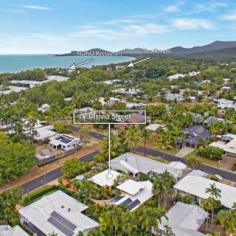  3  Trivia Street, Palm Cove, QLD  4879 HOUSE FOR SALE IN PALM COVE STUNNING BEACHSIDE PAVILION RESIDENCE AT AN EXCLUSIVE ADDRESS 4  Beds  2  Baths  2  Cars An immaculately presented home in the heart of the Golden Triangle of Palm Cove where the Mediterranean meets Tropical North Queensland. The blending of architecture with bespoke design features and stylish decor makes this elegant residence a cut above the rest. Located opposite Tom McDonald Park, and just a three-minute stroll to Cairns' premier beach, this home is in the best street, in the best suburb, north of Brisbane. Designed and built by Chris Blanche, this breathtaking private residence comprises two pavilions where its engagement with the tropical surrounds welcomes the outdoors in, all year round. The impressive entrance entices you across an enchanting timber bridge over twin fishponds surrounded by exotic tropical plants, setting the tone and welcoming you into an open courtyard between the two pavilions. The front pavilion houses the open kitchen, lounge, dining, and covered alfresco entertaining areas, all of which overlook the pool, the spa and the lush tropical verge surrounding the property. The rear two level pavilion features three ground floor bedrooms, bathroom, laundry, guest toilet and ample storage; while the parent's retreat master bedroom is on the upper level complete with WIR and ensuite. This level has wrap around windows offering a picturesque view across to leafy expanse of Tom McDonald Park, a view which is framed by the large Pandanus palms directly below. This beautiful home lends itself to entertaining in style as the front pavilion houses natural timber concertina and French doors that open onto the covered patio and terracotta tiled pool area, opening the entire living area up and inviting the outdoor ambience in. With a recent kitchen makeover, the installation of solar heating. LED lighting, eco ceiling fans and window tinting, this home is perfect for families and friends to enjoy being part of the Palm Cove luxe resort lifestyle. There is so much to love: A fully fenced 700 m2 block with professionally designed gardens, complete with fully functioning water reticulation system Bespoke wrought iron gates and ironwork by Elefantus Double remote garage with lots of storage Solar panels installed Heat resistant protective paint applied to roof High ceilings throughout and wide walkways Fully air conditioned Kitchen with breakfast bar, gas cooking, and granite bench tops Extensive custom-made timber windows, louvres and doors Security and insect screens Just a short stroll from your new home is the beautiful palm fringed esplanade of Palm Cove where you will find an array of fine dining restaurants, casual cafes and boutique shopping. Ray White Smithfield For your private inspection, contact: Matthew Pearce 0418 708 758 Simon Batt 0400 932 229 Land: 	 700m² / 0.17 acres Parking: 	 2 garage spaces Bedrooms: 	 4 Bathrooms: 	 2 