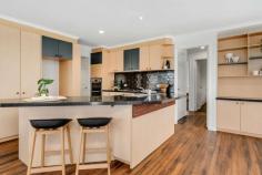  9 Amagula Avenue Ngunnawal ACT 2913 Set on the high side of the street sits this luxury Ngunnawal home. With a generous 198.7sqm of internal living space, an abundance of storage areas and great views over Ngunnawal and beyond, this home is ideal for a family looking for something special. Boasting two separate living areas complete with an open plan design and generous granite bench space in the kitchen, this grand home is definitely a gem. Originally the builder's own display home, those who inspected when on display were very impressed with the architectural brilliance shown with the floorplan offering extraordinary flexibility to meet the needs of most families whilst being uniquely different to so many other homes. You'll love the 100 year old recycled solid Tallowood flooring in the living areas giving character and warmth, blending beautifully with any type of furnishings - timber originally sourced from historic Sydney University. The northern wing showcases the open plan light, bright kitchen and family room,segregated from the lounge room and dining at the southern end. Two bedrooms are privately tucked away to the rear, whilst upstairs is the inviting huge loft-style master bedroom with ensuite and walk-in robe. Adjacent to the master bedroom is a sitting room or parents retreat that could easily double as an additional bedroom or nursery. To enjoy the view outdoors, there are balconies off both the family room and dining room looking across towards the nearby golf course town centre. The backyard is private and secure, also offering a paved courtyard area providing a shady recluse. Being at the Nicholls end of Ngunnawal, it is an easy walk to Gungahlin Lakes golf course and just 5 minutes drive (approx) to Gungahlin Town Centre without having to navigate multiple roundabouts - only one roundabout to main arterial road taking you directly to Canberra CBD. Just a short distance from a selection of schools, shops and public transport options, this beautiful home presents an unmissable and rare opportunity for the discerning buyer! 