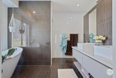  162 Pasley Street Huntly VIC 3551 $890,000 - $979,000 Sitting on over 4,000 square metres, this 5 bedroom home boasts fantastic size not only in the block but in the house itself. With 3 living spaces plus a parents retreat, and a dedicated home office, as well as 3 bathrooms. This fabulous Todd Newman build offers grand hallways and high ceilings throughout. Opening up into a large open plan living, dining and a kitchen area. The entertainers' kitchen boasts 900mm wide gas appliances, a large walk-in pantry, great amounts of storage and a breakfast bar. This space leads out to a large undercover alfresco area. The master bedroom offers a walk-in robe, ensuite bathroom with twin vanity and a separate parents' retreat. All remaining bedrooms are a great size and offer built-in robes. The home is kept comfortable with ducted heating and cooling throughout and also has the convenience of a double lock-up garage with direct internal access. The home also offers fantastic shedding and carport, plenty of room for all the toys! Huntly has seen fantastic growth, with great infrastructure and amenities.  