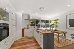  22 Wilsons Creek Road Helensburgh NSW 2508 Wake up to the sounds of birds singing and then enjoy your morning coffee whilst surrounded by nature. This 3 bedroom home, positioned on 2,036m2 has been tastefully renovated and fully fitted out with smart technology. It offers the perfect escape from the 'rat race' while not compromising on modern comforts. It is truly a 'must see'. YOUR HOME * The natural bush setting and peaceful surroundings provide you with an ideal sanctuary from the busy outside world. You will be greeted by native birds, mature trees and an actual babbling brook just metres from your back deck. The moment you cross the threshold you are sure to feel the weight lift from your shoulders. * The majority of this huge 2,036m2 block is level, cleared and able to be enjoyed. Properties of this size are becoming increasingly rare. * Style, comfort and convenience were at the forefront when this home was fully renovated during recent years. It boasts modern finishes and utilises smart technology throughout the house. A modernised home in a truly organic setting. * For those who love the location as well as the land and require a bit more room to move, the home lends itself to further extensions with a second level offering the opportunity for even more impressive bush views. * The layout of the home flows well, from the front door through to the living area and outdoor entertaining space beyond. It is ideal for a family or couple. * In addition to the main residence, this property features a separate studio which is perfect as a generously sized home office, art studio, workshop or rumpus room. YOUR LIFESTYLE * Wilsons Creek Road is a quiet cul-de-sac street with plenty of friendly families. Kids can play safely together in the streets and surrounding bushlands. * This is one of the last remaining areas where you can find a peaceful regional lifestyle less than an hour from Sydney. It offers all of those charming lifestyle benefits that one would associate with small town living:- bushwalking, swimming holes, bike tracks, sporting clubs, cafes and of course plenty of friendly people. * Helensburgh train station is situated only a few minutes walk from your front door ensuring you will never have to compete for parking spaces when commuting. * Picturesque Stanwell Park Beach is less than 10 minutes drive. Enjoy Coastal living without the huge price tag. Helensburgh is becoming an increasingly popular suburb so there is no better time than today to secure your own little haven in this family friendly area. Only 45 minutes South of Sydney and 30 minutes North of Wollongong. 