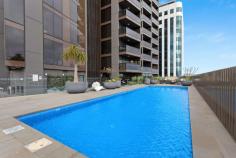  2605/421 King William Street Adelaide SA 5000 $899,000-$949,000 This luxurious two-storey penthouse apartment will make you feel like you're on top of the world! Prestigious executive living is yours to enjoy, with stunning views and a state-of-the-art quality interior. A spacious open plan living and dining area has parquetry oak flooring, modern fireplace, and an up-to-the-minute Samsung TV, theatre system with multi-room audio and RTi iPad/RX7 touchscreen system. Floor to ceiling windows showcase the staggering views across to the coast. Step out onto a private balcony and share a bottle of wine while the sun sets. The gourmet kitchen is a chef's dream. Miele appliances, induction cooktop, built-in fridge, dishwasher and even a coffee machine are included alongside quality granite bench tops and sleek cabinet storage. There are incredible views from both bedrooms, with the main bedroom in a coveted corner position. Both the en suite and main bathroom are gorgeous, with marble floor-to-ceiling tile and a dual vanity to the main. Entertaining? Step up to your own private rooftop entertaining balcony, complete with full outdoor kitchen. Fully fitted with a barbecue and bar fridge, you can kick back and let the good times roll! An additional store room is a huge bonus. Vue on King William is an award-winning building designed for upscale living. A full sized pool and sun deck, plus quality recreational gym, are available for use on level 7. An intercom system offers peace of mind, and there are two secure car parks assigned to you. Live in the centre of Adelaide and explore everything this exciting city has to offer. Exciting gourmet eateries along Gouger St, the fresh produce in the famous Central Markets and some of the best coffee shops in the world are all within a short walking distance. The free Adelaide tram stops just outside the door, making it easy to get around the CBD. Or take a ride to Glenelg! Adelaide is host to a swathe of prestigious schools and every amenity you could want. This is a true lifestyle opportunity for the discerning buyer who only wants the best. A must to inspect! What we love: . Amazing central location close to cafes, markets, entertainment and public transport . Gorgeous two-storey penthouse finished to perfection . Exclusive rooftop entertaining balcony with outdoor kitchen . Panoramic views from almost every room across to the coastline and hills . Gourmet kitchen with Miele appliances . Stunning upscale en suite and main bathroom . Samsung TV, theatre system, multi-room audio, RTi iPad/RX7 touchscreen system . Ducted reverse cycle air conditioning . Floor to ceiling windows . Superbly finished to the very highest quality throughout . In award-winning Vue on King William, with pool and gym . Two secure car parks 