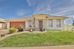  48 Eastside Drive Mildura VIC 3500 $349,000 - $383,000 The layout is bright and modern with easy-care tiled flooring and evaporative air-conditioning ducted throughout the home for complete comfort, as well as a split system. The open-plan living space is perfect for the entertainer, plus a well equipped kitchen with gas cooking, and ample storage ensure the perfect cooking space. The four bedrooms are all a great size with the master bedroom offering a walk-in robe and a modern ensuite. A double garage with an automatic door and a laundry complete the layout. The 575sqm well maintained block and low maintenance gardens are serviced by an automatic watering system for added conveniences. 
