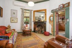  111 Buckland Gap Road Beechworth VIC 3747 $650,000-$680,000 Overlooking Beechworth township "Bella Vista" is a classic example of colonial Australian architecture that has stood the test of time for the last 140 years. The entrance to the home, along the path and through the garden, guides you to the hall with the adjoining four traditional "12 foot x 12 foot" rooms. These four rooms, with "11 foot" ceilings, comprise three bedrooms and the formal lounge. The lounge features an open fireplace and split system heating and cooling unit. At the rear of the home sits the large kitchen and meals area. Here you will find an efficient wood heater in the original fireplace plus a freestanding oven with gas hotplates. A central bathroom, with a separate toilet, a laundry and storage area, are also found at the rear. The depth of colour and variety of flora on the property is a credit to the current owners. Here you can immerse yourself in the bird attracting garden and work on your green thumbs. Despite having town water, the soft lawns and the garden are fed by a perpetual well meaning you can rest easy knowing your town water bills are at a minimum. With verandas on three sides, you have options where you can enjoy your refreshments whilst taking in views of the garden and surrounding countryside. The main body of the home has been reroofed and has been electrically rewired. The 10m x 6.1m shed and workshop area will keep your vehicles and tools out of the weather. There are many options if you wish to construct a larger shed on the land (STCA). The property has the ability to be sectioned into different zones providing plenty of space and making it easy to care for your animals whilst ensuring they don't eat your plants! 