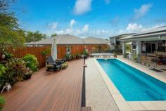  4 Bundey Street Bentley Park QLD 4869 $649,000 If You Love the Outdoors … You're Very Welcome - Room for Shed + Extra Parking to Side on 798m2 What an opportunity to purchase this wonderful home with absolutely nothing to do but move in. Designed for exceptional entertaining, Therese Plath invites your inspection of this spacious fully air conditioned family residence conveniently located in a quiet street in Silkwood Ridge, Bentley Park. Surrounded by the picturesque mountain backdrop and just minutes to primary schools, high schools, sporting venue and shopping centre and only 20 minutes to Cairns City. The spacious open-plan living and dining area lends itself to casual gatherings and everyday living. Inviting plenty of natural light and refreshing breezes into the home, this light filled and contemporary home offers quality lifestyle - a perfect example of low maintenance living surrounded by an abundance of conveniences. This home is simply ideal for busy families complete with four bedrooms. The heart of the residence, is an immaculate kitchen showcasing a generous breakfast bar and a functional culinary space. Intuitively designed to cater for busy working families the kitchen displays a pantry, dishwasher, new induction cooktop, range hood, electric oven, large fridge space and plenty of bench and overhead cupboard space with stainless steel appliances. What will really impress is the ease-of-living offering a seamless indoor | outdoor connection to the extensive covered tiled entertaining area. This private entertainer's paradise overlooks the magnificent glass framed resort swimming pool with swim jet pumps where you will be the envy of all as you enjoy the wonderful mountain views. The spacious main bedroom features walk through wardrobe to the en-suite with double shower with rainmaker shower heads and single vanity and toilet. The remaining three bedrooms have easy access to the family sized bathroom plus separate toilet. A testament to quality, the home's premium fixtures and finishes and inclusions are as follows; Extra-large double lock up garage on remote with internal access Double gate rear access to property to both sides of property Security screens throughout Loads of linen storage Blinds throughout the home 3000 litre water tank 9.9kw solar system + solar hot water Security cameras throughout Garden is established and immaculate, yet low maintenance Outdoor pool shower Swim jet pumps x 3 Multi pool lights and glow rocks in aggregate Wired for generator For those who would like the opportunity to build a shed there is ample room to do so. This ultimate lifestyle opportunity for buyers seeking a low maintenance lifestyle, convenient location close to schools, shopping, sporting and walking paths, this home is one you must inspect. 