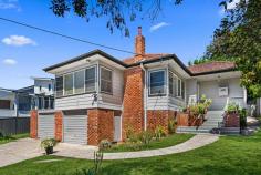  3 Banool Street Keiraville NSW 2500 $1,195,000 Providing a character-filled entry point into a popular part of the village, this spacious single-storey home is neatly presented and ready to enjoy. Bright with natural light and allowing excellent flexibility, it boasts two separate living areas or one lounge/one study, a separate sunroom, a quality kitchen with 40mm stone benchtops and a north-east facing balcony attached to the master bed. High-set with an 18m frontage it has potential for a duplex development (STCA). Only a few minutes' stroll from neighbourhood parks, main street cafes and bus stops for the city and Uni, you'll adore the blend of easy living and outstanding convenience on offer. Features: Sunny lounge with decorative fireplace, separate meals area Tiled kitchen splashbacks, gas cooktop, wall oven, dishwasher Neat bath with tub, second loo in laundry, robes throughout Ducted air, double garage with storage, child-friendly yard Short walk to local shops, primary school + transport links 18m frontage with potential for a duplex development (STCA 