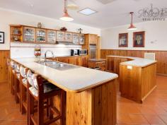  8 Beard Cres Wodonga VIC 3690 $1,150,000 Highly sought after but seldom found, our extensive Federation style home sprawls over two grand levels and offers over 43 squares of premium living all set perfectly on a substantial 1721m2 allotment. Positioned with lovely high elevation, relax on the north easterly facing balcony and enjoy the uninterrupted views over Willow Rise that extend as far as Albury city from daylight to dusk. You will be hard pressed to find a combination offering six bedrooms, three bathrooms, three living areas, five car garage PLUS extensive room for your oversized caravan and incredibly….a yacht! Ground Level: - A fully serviced apartment with kitchenette, en-suite, lounge and bedroom, - Extensive garage and separate entry for secondary garage / boat storage, - Ample wine storage for the astute collector, - The rear of the property is largely excavated for storage and the sheer size and expanse will impress. Upper Level: - Master suite with stunning en-suite, walk in robe and direct access to the balcony, - A further four queen sized bedrooms will accommodate the largest of families, - Full family bathroom with dual basins and stunning claw foot bathtub, - The timelessly designed kitchen is the heart of the home and offers double oven, electric cooktop, dishwasher, walk in pantry and incredible bench space that is truly a rare find. - Flowing seamlessly together, the open plan kitchen, family and dining area encapsulates the views and the atmosphere and banter of a bustling family is going to be most welcome, - The lounge room to the front of the home is oversized, measuring a whopping 8.8 x 7.2 meters. Wrapped by the balcony, the aspect is simply delightful with leafy hills and city lights on show, painting a picture that changes with the seasons, - The laundry is generous, with a store room attached creating a perfect utility area. Balcony and Grounds: - No expense has been spared in the construction of the balcony. Featuring intricate floor tiles, decorative cast aluminum balustrade and fully protected with iron roofing, there is no limits to the use of this area. - A feature swim spa / plunge pool is fitted with a heat pump and solar heating making winters most welcoming. Enjoy a winters night whilst star gazing with a glass of bubbles overlooking the sparkling city lights, - The entertaining area is complete with fan, retractable awning to extend the roofline and multiple water points to care and maintain your plants, - There are three driveways in total; the first to the main garage, second to the caravan / boat bays and a third separate drive wraps to the rear yard that is certainly generous in size. Utilities: - Evaporative cooling, 6 star rated ducted gas heating unit and cosy wood fire upstairs with a split system unit downstairs, - Two instantaneous hot water units (including hot and cold water outside the 5th garage) - 3.04kw solar system with 66c per kw until 2024. 