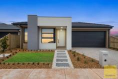  20 Roccella Avenue Truganina VIC 3029 $500,000- $550,000 Rajesh and Ray White Team proudly presents 20 Roccella Avenue, Truganina. With 6.5 hectares of green open spaces, Olivia is the ideal community to raise your family, upsize to your dream home, or invest for the future. 5-minute drive to Rockbank train station 30-minute drive to Melbourne airport 5-minute drive to the Western Freeway 10-minute drive to bustling Caroline Springs 30-minute drive to Melbourne's CBD Located in the prestigious Olivia estate is a modern contemporary and brand new house. Located 28 Kms from the Melbourne CBD, Olivia Estate is best positioned for future growth. Its a fast growing and highly sought-after location in Truganina surrounded by all the upcoming amenities you could have. This brand new home comes equipped with luxury turn-key inclusions such as professionally styled interior colour themes, stone bench tops, carpets, tiles, higher ceilings and much more. Ticks all the buyer's wish list 4 bedrooms, 2 bathrooms & double garage Master with a walk-in robe High ceiling, down lights Kitchen with walk in pantry Flooring - Timber laminate flooring, Carpet and Tiles Evaporative cooling and ducting heating Roller Blinds Quality stainless steel appliance 40mm stone benchtop with waterfall feature. Render façade with exposed aggregate driveway Security alarm Remote Controlled double Garage This superb home has been intuitively crafted to create a light filled residence offering an easy care lifestyle dedicated to modern family living.  