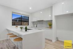  20 Roccella Avenue Truganina VIC 3029 $500,000- $550,000 Rajesh and Ray White Team proudly presents 20 Roccella Avenue, Truganina. With 6.5 hectares of green open spaces, Olivia is the ideal community to raise your family, upsize to your dream home, or invest for the future. 5-minute drive to Rockbank train station 30-minute drive to Melbourne airport 5-minute drive to the Western Freeway 10-minute drive to bustling Caroline Springs 30-minute drive to Melbourne's CBD Located in the prestigious Olivia estate is a modern contemporary and brand new house. Located 28 Kms from the Melbourne CBD, Olivia Estate is best positioned for future growth. Its a fast growing and highly sought-after location in Truganina surrounded by all the upcoming amenities you could have. This brand new home comes equipped with luxury turn-key inclusions such as professionally styled interior colour themes, stone bench tops, carpets, tiles, higher ceilings and much more. Ticks all the buyer's wish list 4 bedrooms, 2 bathrooms & double garage Master with a walk-in robe High ceiling, down lights Kitchen with walk in pantry Flooring - Timber laminate flooring, Carpet and Tiles Evaporative cooling and ducting heating Roller Blinds Quality stainless steel appliance 40mm stone benchtop with waterfall feature. Render façade with exposed aggregate driveway Security alarm Remote Controlled double Garage This superb home has been intuitively crafted to create a light filled residence offering an easy care lifestyle dedicated to modern family living.  