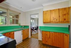  19 Gawler Crescent Deakin ACT 2600 Fabulous opportunity to purchase a property almost at the front gate of the Canberra Girls Grammar Senior School. Such a lovely crescent with many new homes however it still retains the charm and character of this very much sought after suburb. Built in the mid 1950's of solid brick construction, high ceilings and sash timber windows. Either renovate or knock down and start again. The decision is yours but keep in mind there are less and less opportunities!! Features, Built 1956 Solid brick construction High ceilings Sash timber windows 3 double size bedrooms Ensuite to main bedroom plus study/office/ dressing room Extended living room and dining room Open fireplace Ducted gas heating Dishwasher Carpets and curtains throughout Front patio Timber deck at rear Tandem garage under plus storage Well established private gardens 