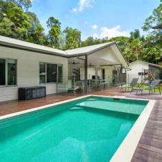  22  Coconut Grove Kuranda, QLD  4881 HOUSE FOR SALE IN KURANDA NEAR NEW - PRIVATE - TRANQUIL 4 Beds 2 Baths 3 Cars ABSOLUTE PRIVACY HERE All the mod cons in a tropical oasis. This designer home was purpose-built for the whole family to enjoy. Two living areas, large bedrooms, amazing kitchen area that looks out over the pool and entertainment area, loads of storage space for all the toys, and all this sits on a gorgeous 3759m2 block - you even have a cyclone shelter! Or wine cellar- your choice. Built for our enviable lifestyle and environment, the home is built of low-maintenance materials that need little upkeep - perfect. Ideally positioned at the end of the street in one of Kuranda's prestigious locations is another bonus. Airconditioned & Crimsafe screens Most areas of the home open to outside Stunning timber floors throughout Fantastic outdoor entertaining is well catered for here Magna pool with a stunning rainforest backdrop Town water House & carport are both steel framed This is a stunning low-maintenance home with nothing needed except to move in and enjoy! Ray White Smithfield Call Sonia Poole on 0407 028 388 for further information or to arrange an inspection. Land: 	 3,759m² / 0.93 acres Parking: 	 3 garage spaces Bedrooms: 	 4 Bathrooms: 	 2 